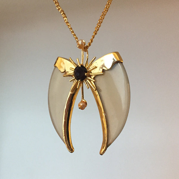 AVANI Gold Faux Tiger Claw Sunburst Pendant