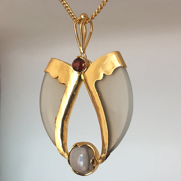 AVANI Gold Faux Tiger Claw Red Lens Pendant