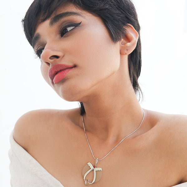 AVANI Silver Faux Tiger Claw Red Lens Pendant