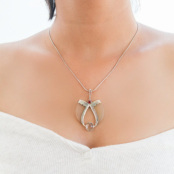 AVANI Silver Faux Tiger Claw Red Lens Pendant