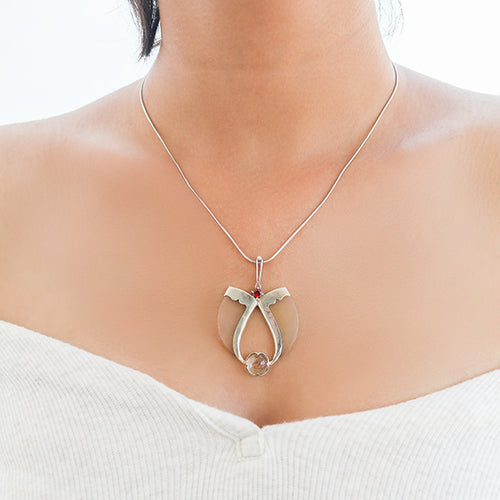 AVANI Silver Faux Tiger Claw Red Lens Pendant